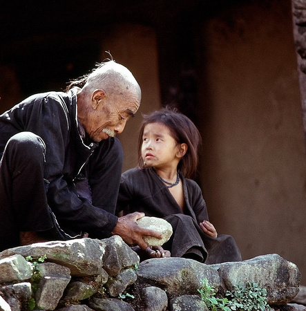 A child with grandpa.