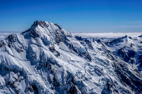 View from helicopter of mountains and vast icefields