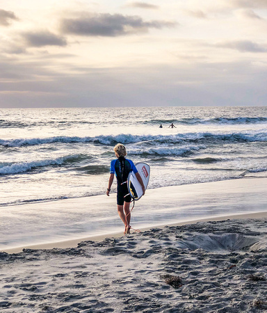 Jake going out for evening surf 9-2-18