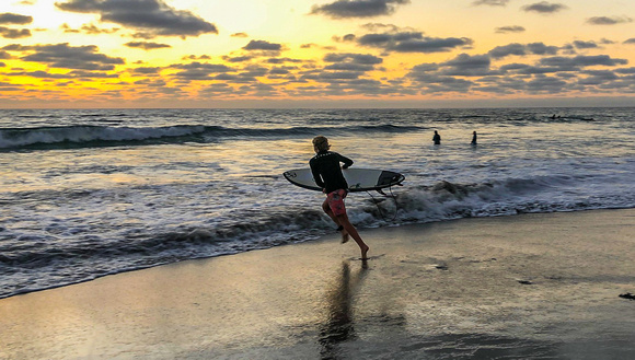 Jake heading out for an evening surf 9/3/20